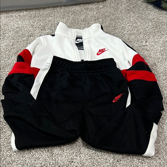 Nike Kids Black Joggers with Red and White Accents - Picture 1 of 5